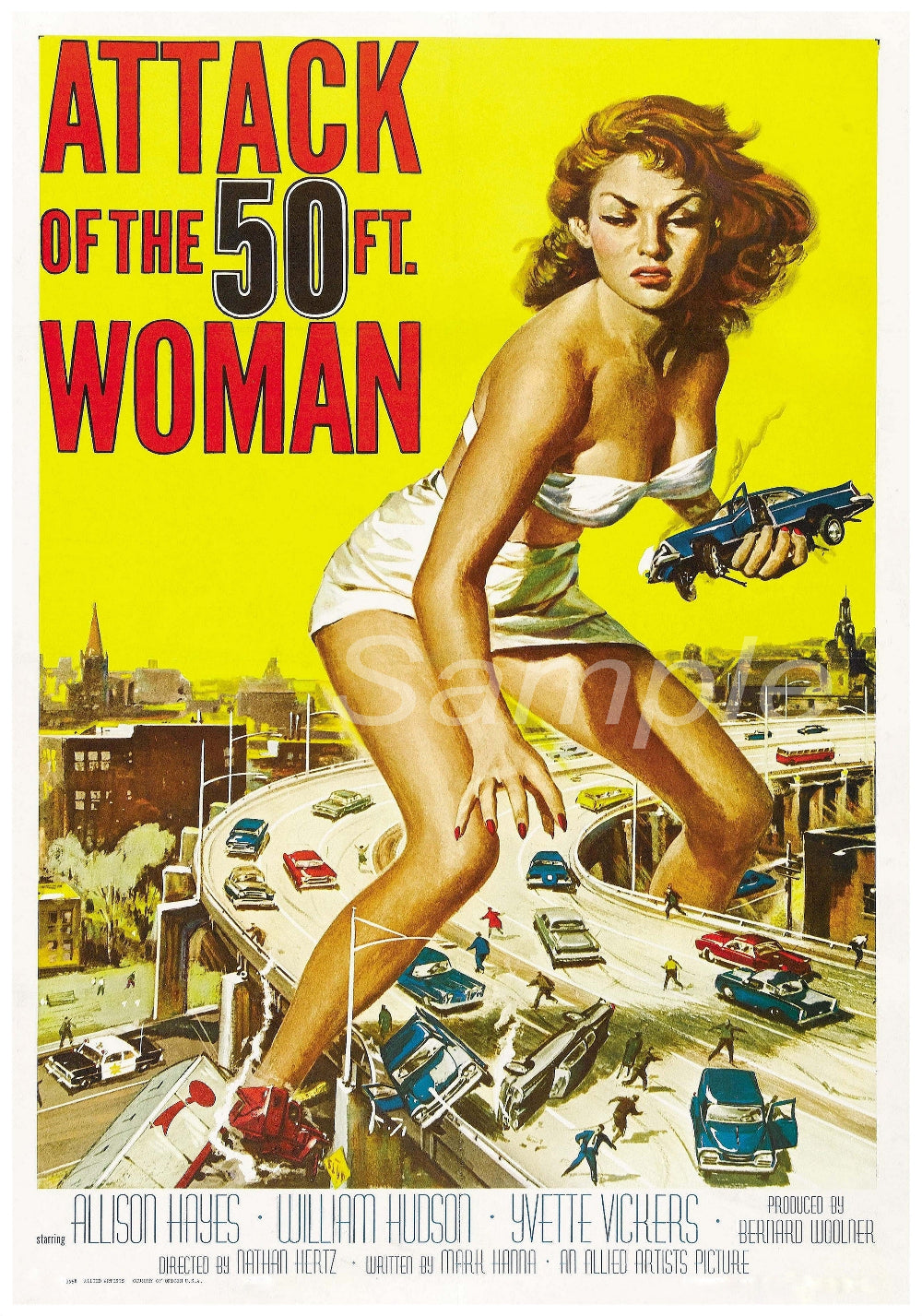 Vintage movie poster featuring a woman in a white dress and red heels standing over a car with the text 'ATTACK OF THE 50 FT WOMAN' in bold lettering.