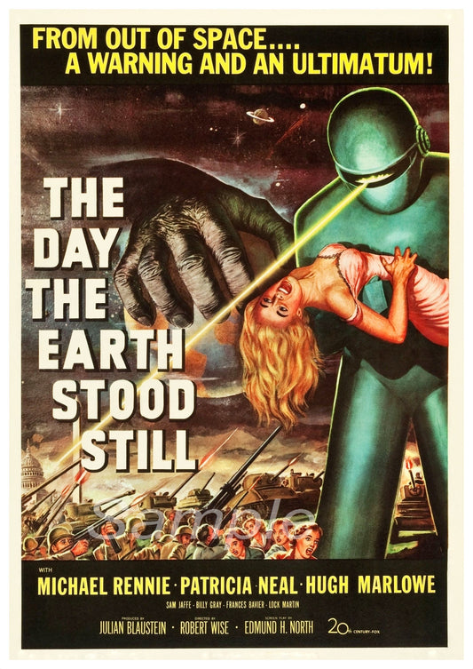 Vintage movie poster print for 'The Day the Earth Stood Still' featuring a green alien holding a ray gun with a Earth cityscape in the background.