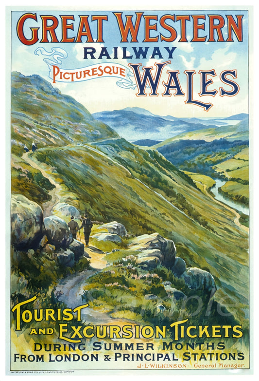 A vintage railway poster print depicting a scenic view of Wales with mountains and a river, promoting tourist and excursion tickets.