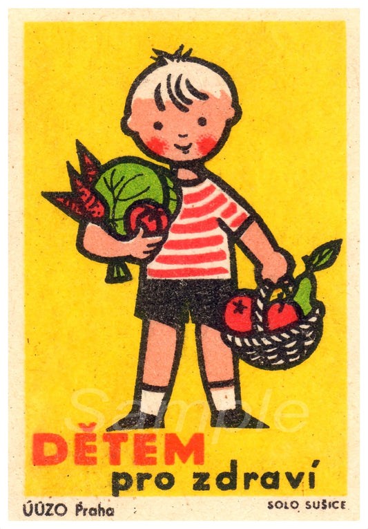 Vintage matchbox label with a child holding vegetables on a yellow background