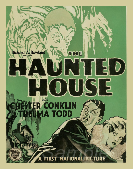 Vintage movie poster print of 'The Haunted House' featuring illustrated characters and a spooky house on the artwork.